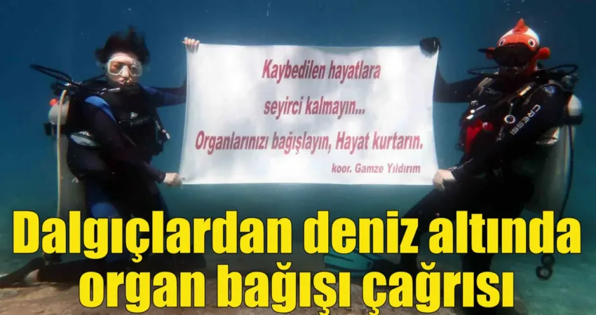 Muğla’nın Fethiye ilçesinde dalgıçlar, deniz altında açtıkları pankartla organ bağışının