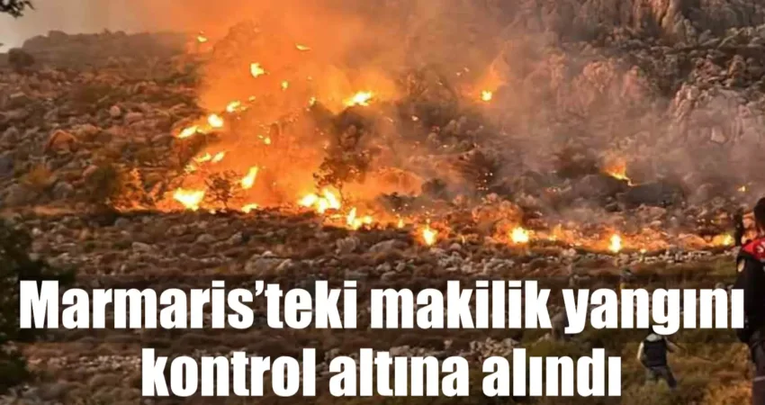 Muğla’nın Marmaris ilçesinde sarp arazideki makilik alanda çıkan yangın ekiplerin