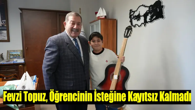 Milas Belediye Başkanı Fevzi Topuz, kendisinden gitar talebinde bulunan öğrenci