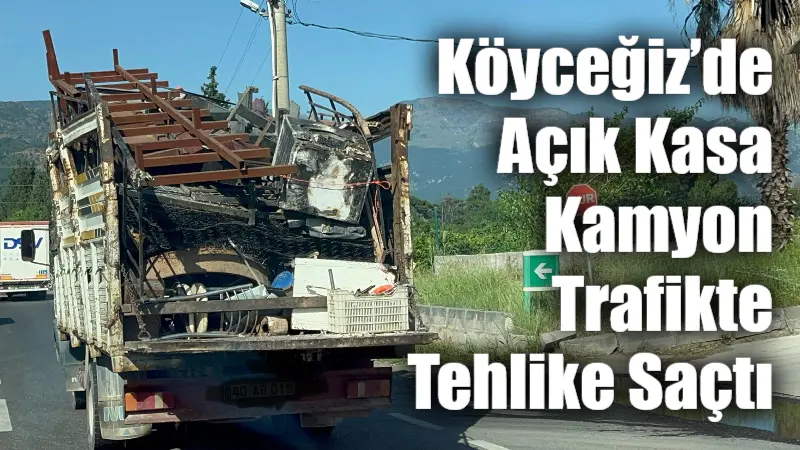 Muğla’nın Köyceğiz ilçesinde seyir halindeki bir kamyonun arka kapağının açık