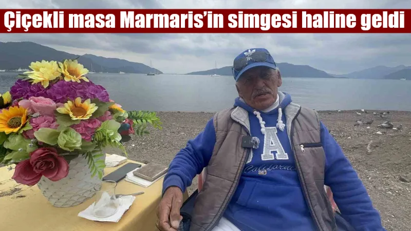 Marmaris Halk Plajı'nda 10 yıldır kurduğu rengarenk çiçekli masasıyla yerli
