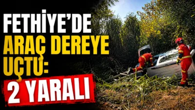Muğla’nın Fethiye ilçesinde kontrolden çıkarak dereye uçan otomobilde mahsur kalan